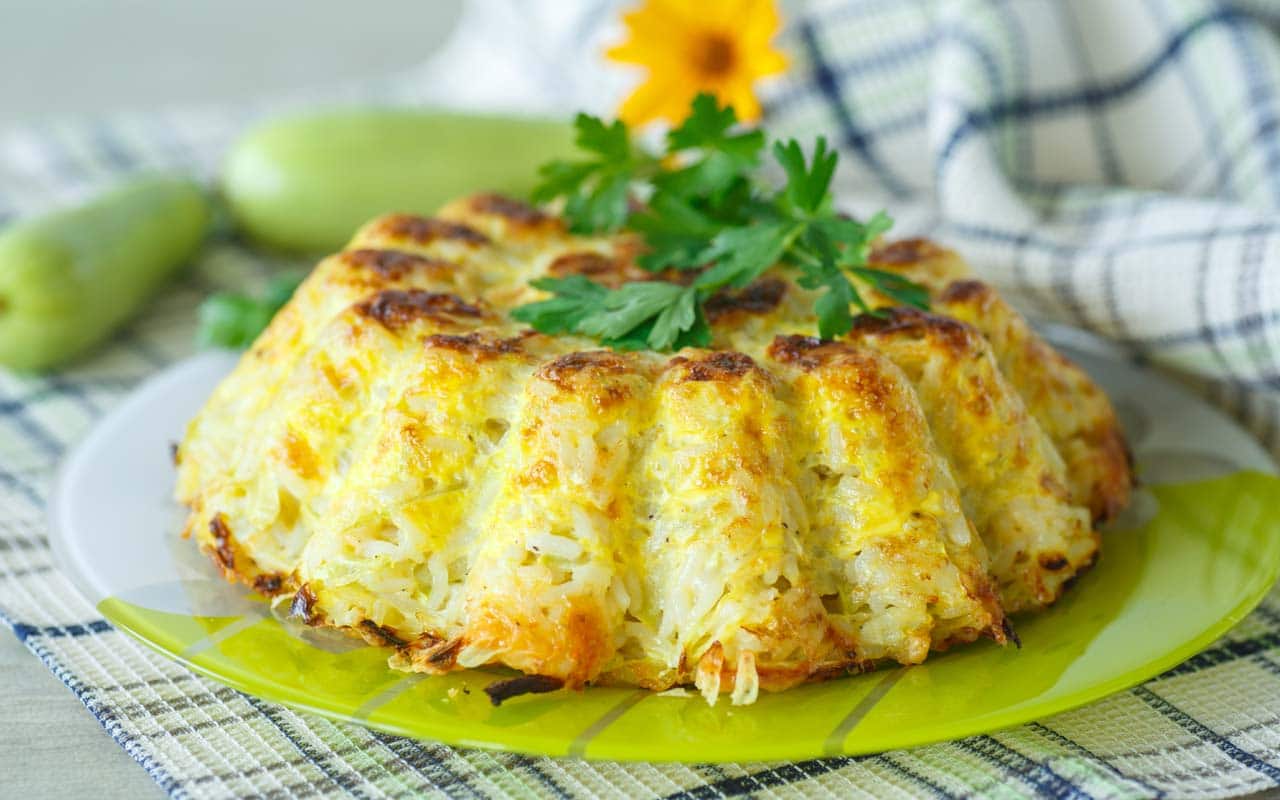 Torta di riso con patate e zucchine - Ricette Selenella